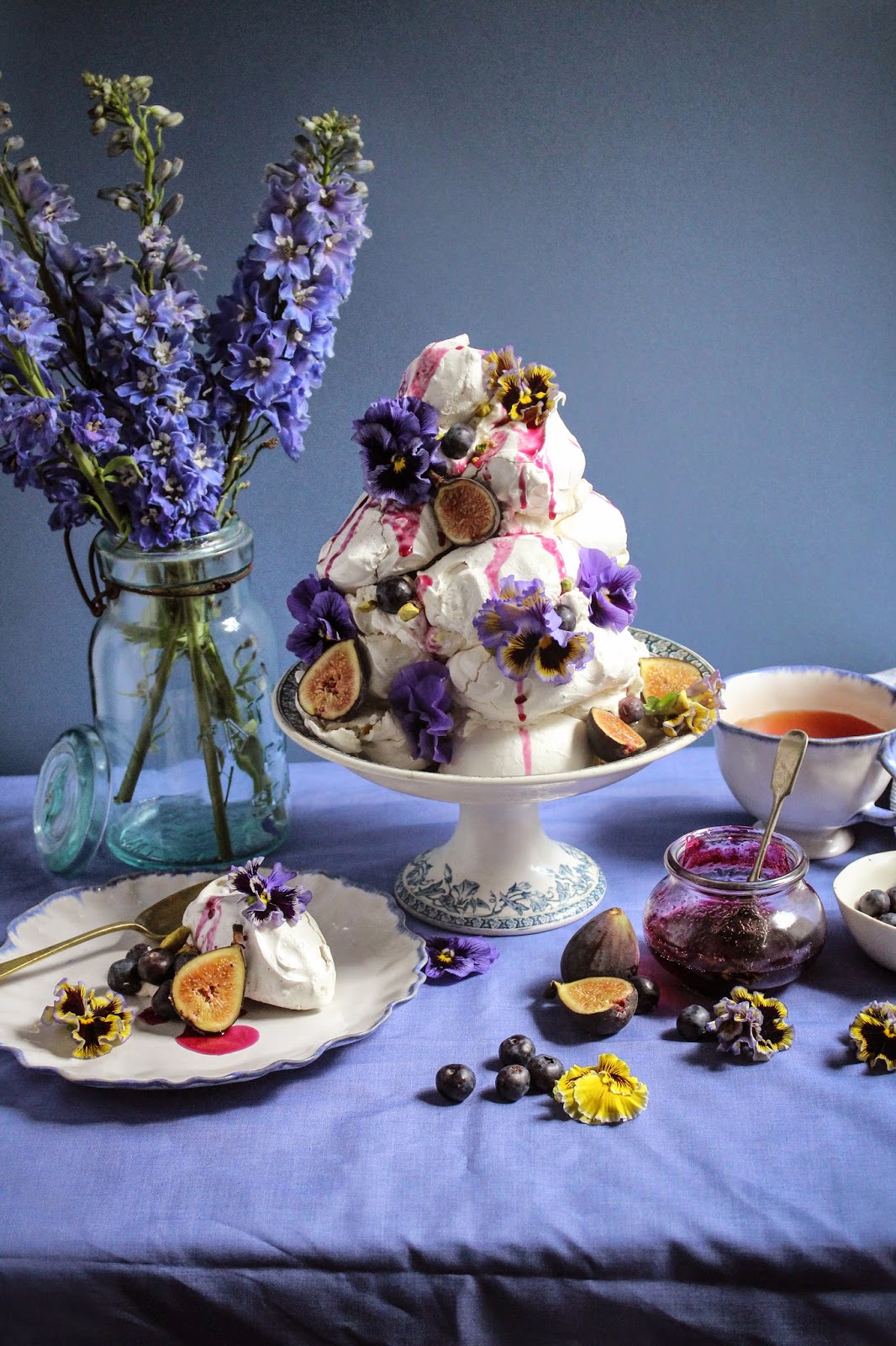 earl grey pistachio meringue tower with blueberries and figs and edible